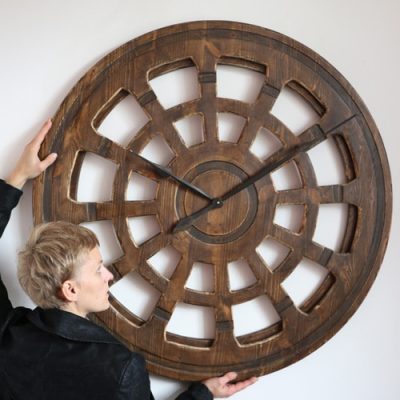 large wooden skeleton clock
