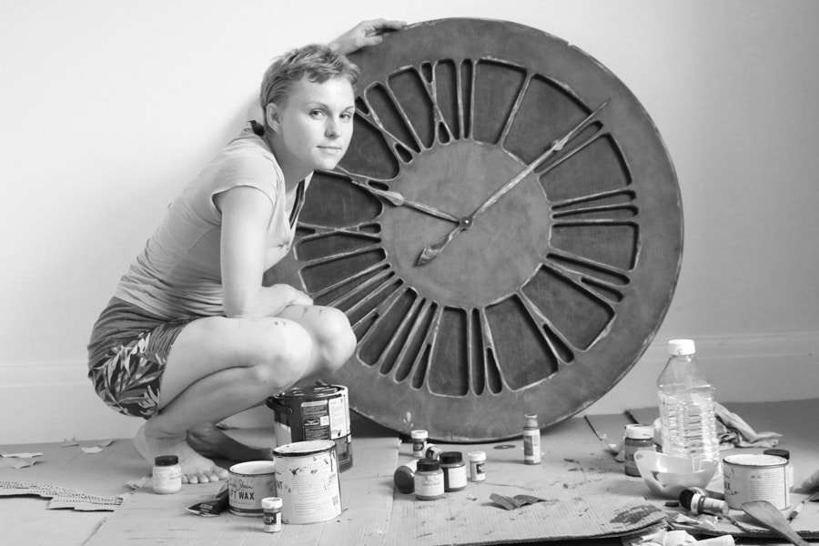 handmade clocks with artist black and white